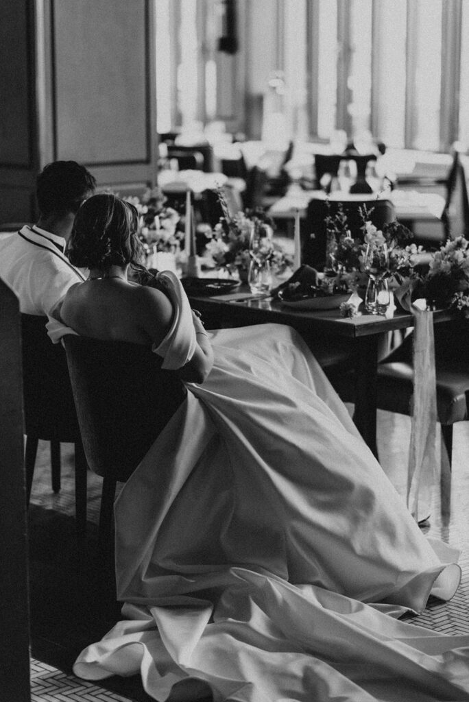 Bride and Groom seated at their dinner table