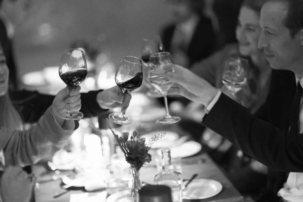 wedding guests drinking wine